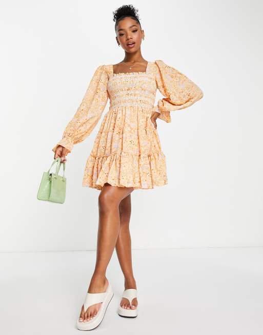 Just Me puff sleeve tiered smock dress with floral print in orange