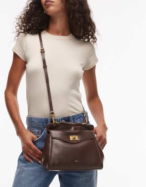 JW PEI Lucia classic top handle bag with crossbody strap in dark brown - view 1
