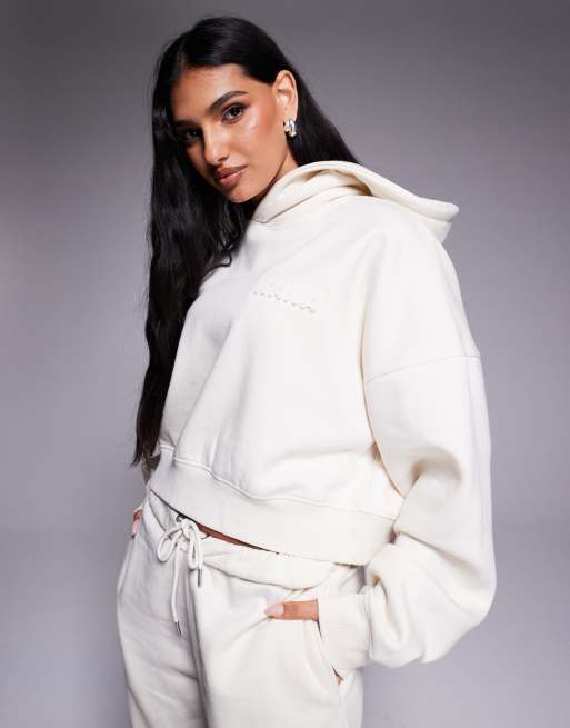 Kaiia - Beige oversized cropped hættetrøje i bomuldsrigt materiale med trykt logo i pufdesign - Del af sæt  , 2 af 4