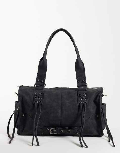 Kaiia bolso de hombro de piel sintética mate con detalle de flecos, hebilla y ojetes en negro - view 1