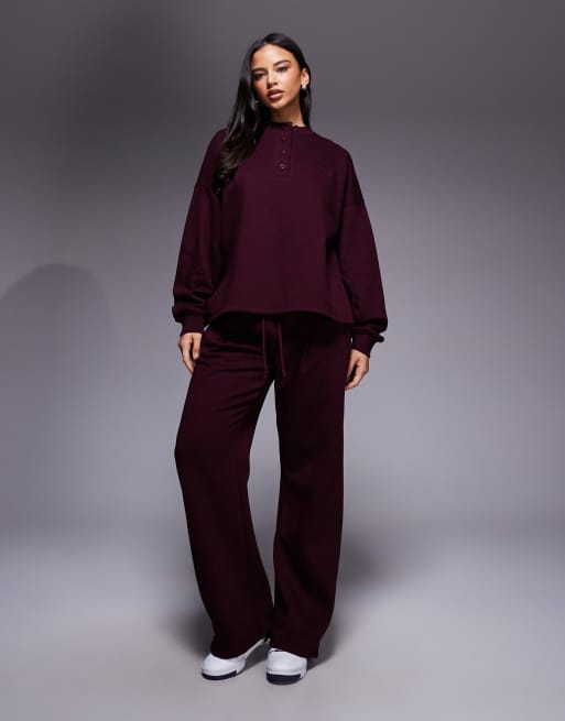 Kaiia – Szary melanżowy zestaw z haftowanym logo: bluza oversize z zapinanym na guziki dekoltem henley i joggersy z szerokimi nogawkami, 2 z 3