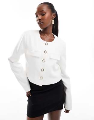 boxy cropped pearl button through jacket in white