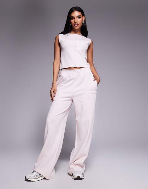 Kaiia bubble embossed logo button-through waistcoat top and wide leg trackies set in light rose - view 1