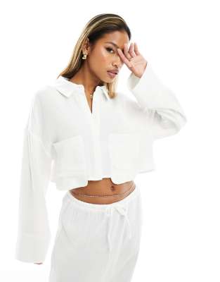 Kaiia - Camicia oversize taglio corto allacciata sulla schiena bianca in lino in coordinato