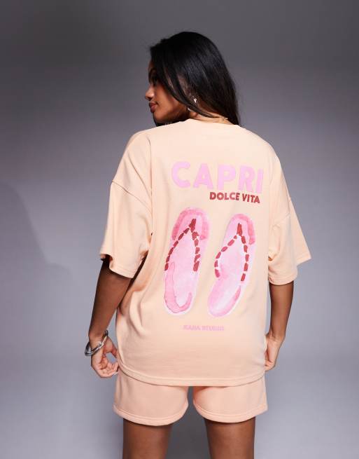 Kaiia - Capri - T-Shirt oversize color pesca con stampa di infradito sul retro