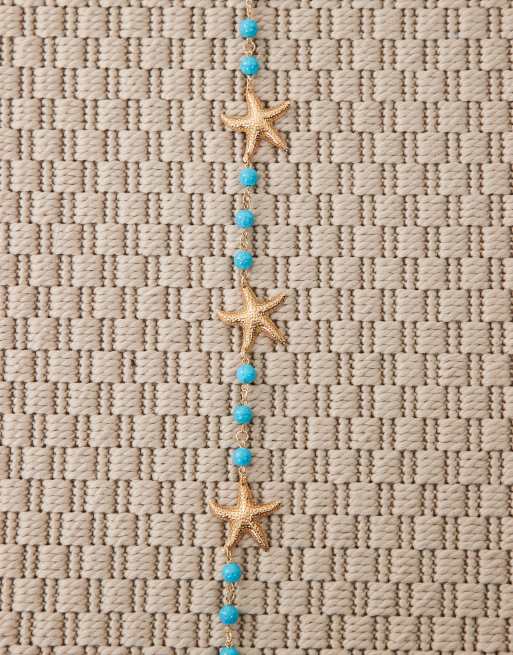 Kaiia - Catenina in acciaio inossidabile con perline e stelle marine tonalità oro e blu, 2 di 3