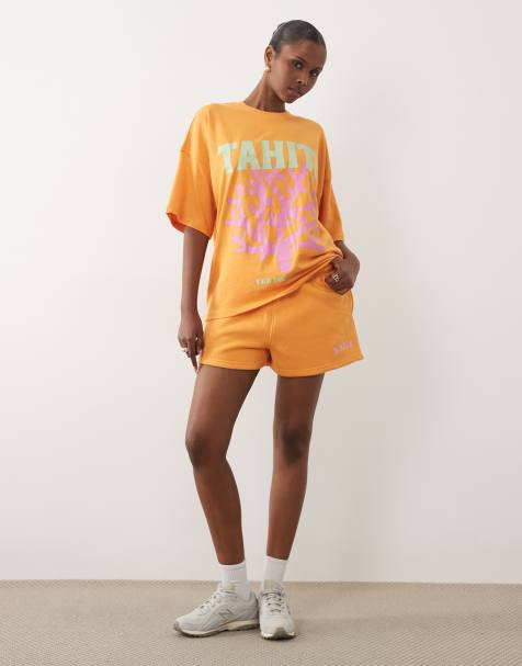 Kaiia - Co-ord set van katoenrijk oversized T-shirt met grafische Tahiti-print en short in oranje en roze - view 1