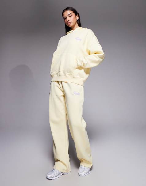 Kaiia - Co-ord set van oversized hoodie met print op de achterkant en joggingbroek met wijde pijpen in citroengeel en lila - view 1