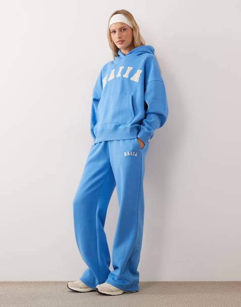 Kaiia - Coordinato blu composto da joggers a fondo ampio e felpa oversize con cappuccio e logo ricamato - view 1