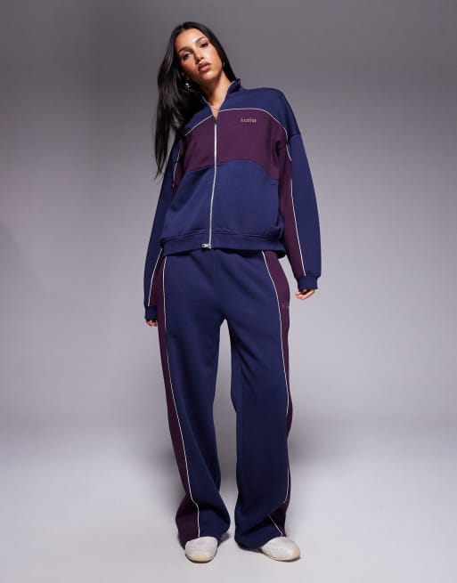 Kaiia - Coordinato blu navy e bordeaux con joggers con fondo ampio e felpa oversize con zip e righe a contrasto