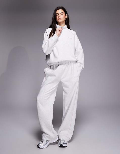 Kaiia - Coordinato grigio mélange con joggers a fondo ampio e giacca felpa corta con zip e logo ricamato - view 1