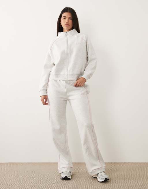 Kaiia - Coordinato grigio mélange con joggers a fondo ampio e giacca felpa corta con zip e logo ricamato