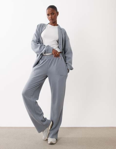 Kaiia - Coordinato premium grigio in tessuto interlock composto da joggers a fondo ampio e giacca oversize con zip - view 1