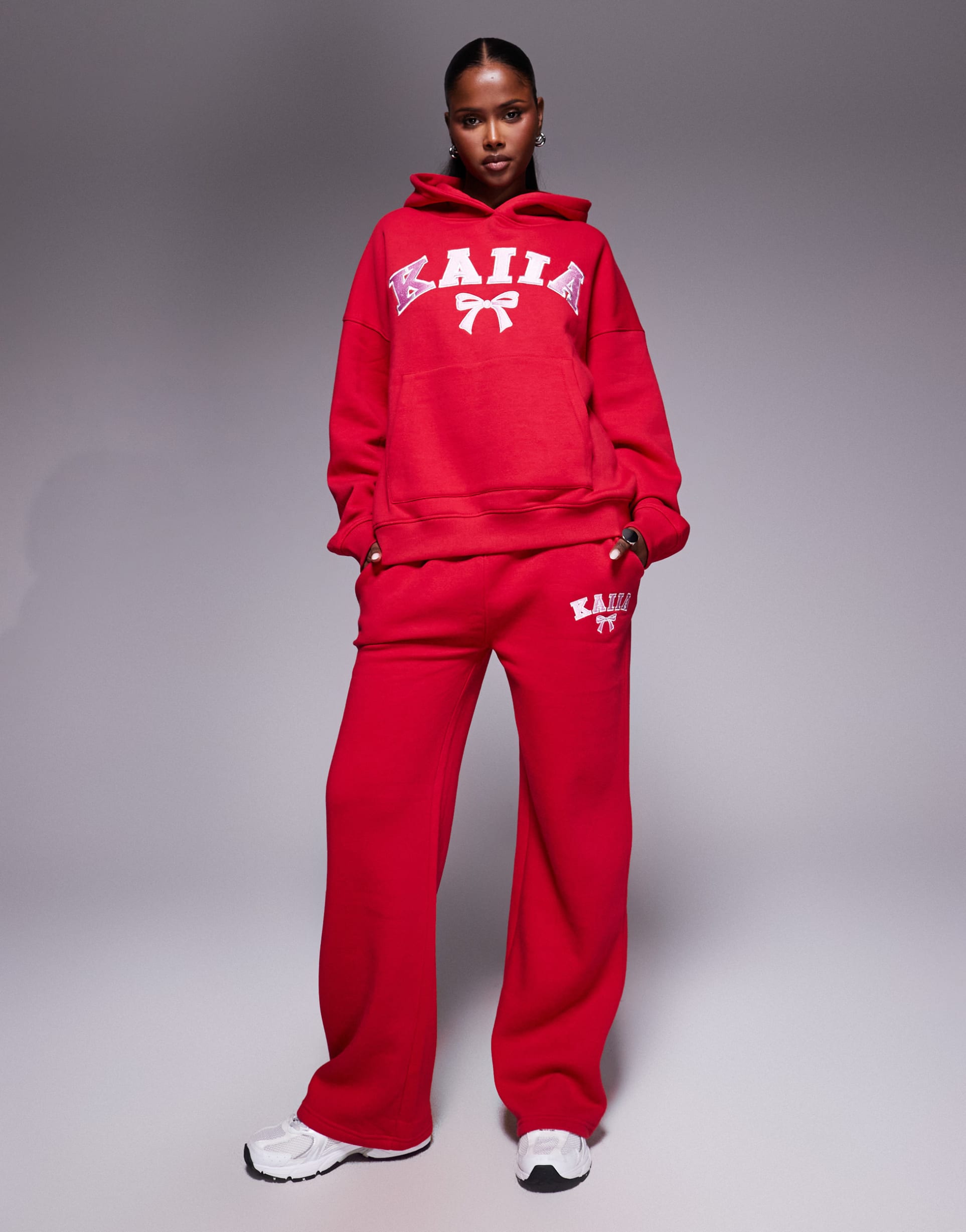 kaiia cotton blend embroidered bow logo wide leg sweatpants in red and pink - part of a set