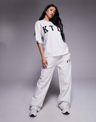Kaiia cotton blend embroidered KTL logo wide leg sweatpants in light gray heather - part of a set
