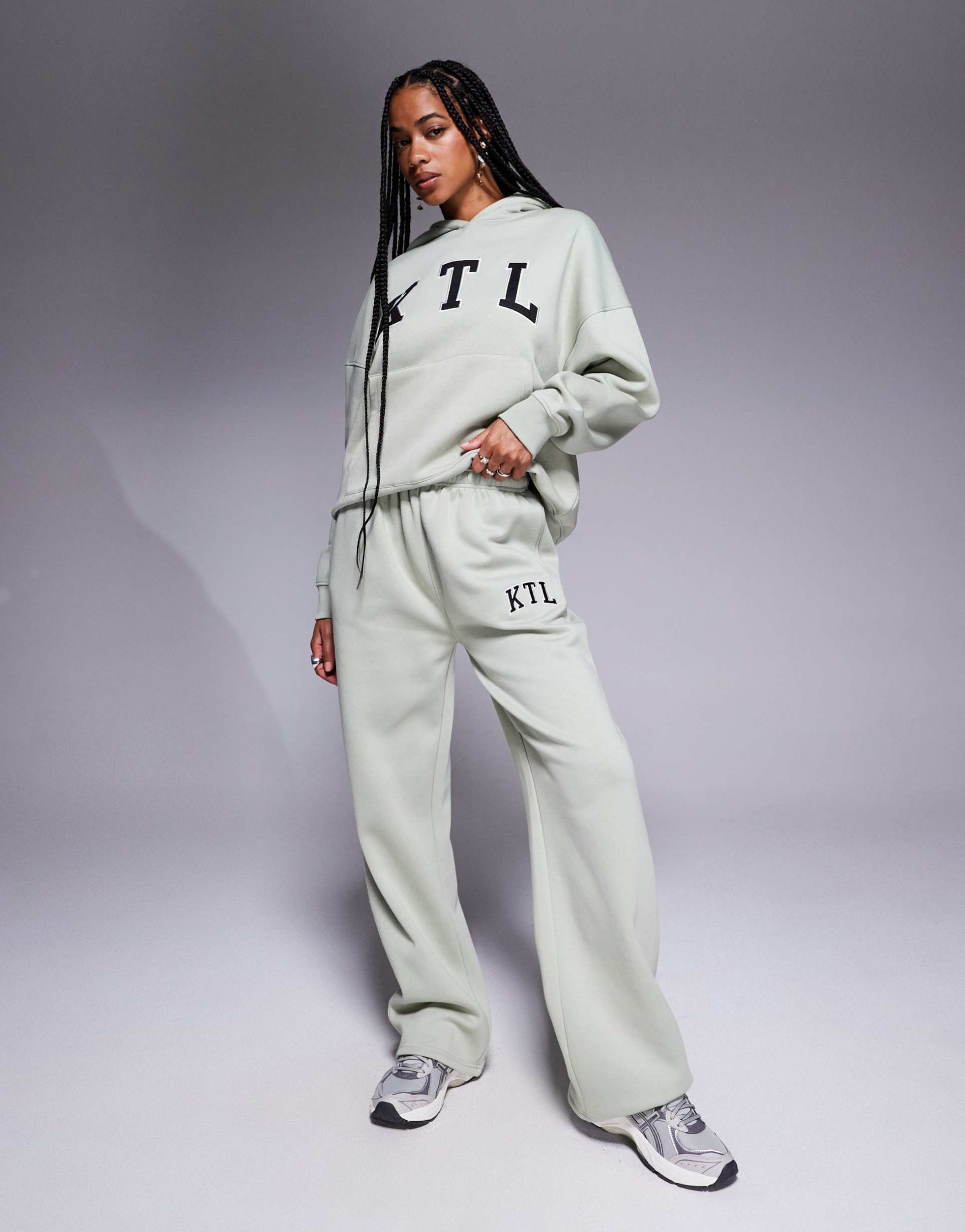 kaiia cotton blend embroidered ktl logo wide leg sweatpants in sage green - part of a set