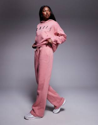 Kaiia cotton blend embroidered logo wide leg sweatpants in pink - part of a set