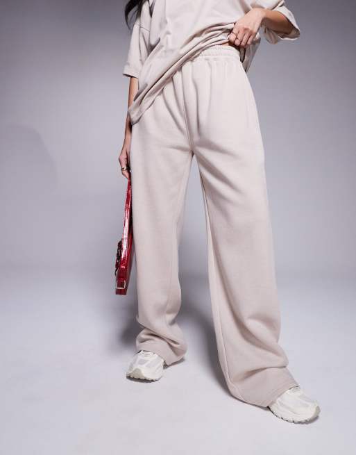 Kaiia cotton blend heart back pocket logo sweatpants in stone and