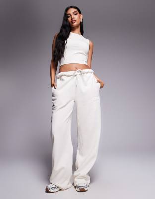 Kaiia cotton rich bubble embossed logo rolled waistband wide leg sweatpants in oat milk - part of a set-Purple
