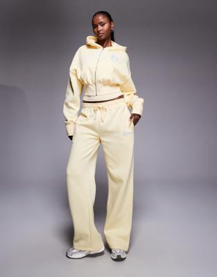 Kaiia Cotton Rich Embroidered Bow Logo Cropped Zip Up Hoodie In Neutral