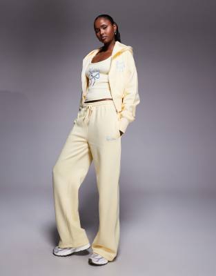 Kaiia cotton rich embroidered bow logo wide leg joggers co-ord in lemon and blue