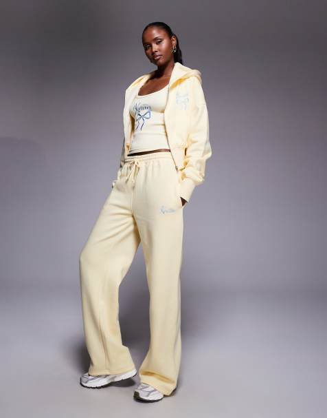Kaiia cotton rich embroidered bow logo wide leg joggers co-ord in lemon and blue - view 1