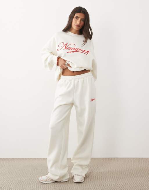 Kaiia cotton rich embroidered New York script logo oversized hoodie and sweatpants in cream and red, 3 of 3