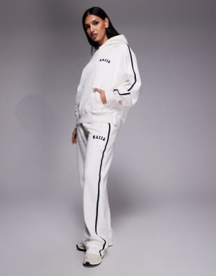 Kaiia Cotton Rich Embroidered Logo Side Stripe Wide Leg Sweatpants In White