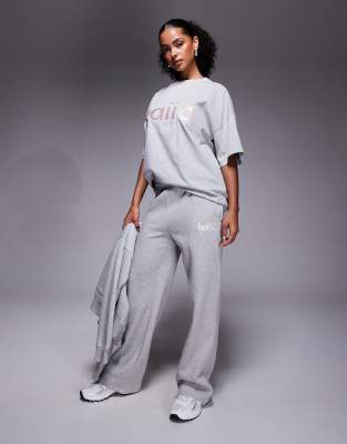 Kaiia Kaiia cotton rich embroidered logo wide leg joggers co-ord in light grey and pink