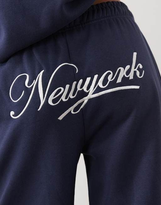 Kaiia cotton rich embroidered New York script logo wide leg sweatpants in navy - part of a set, 5 of 5