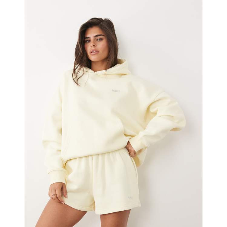 Kaiia cotton rich silver hardware logo oversized hoodie in lemon