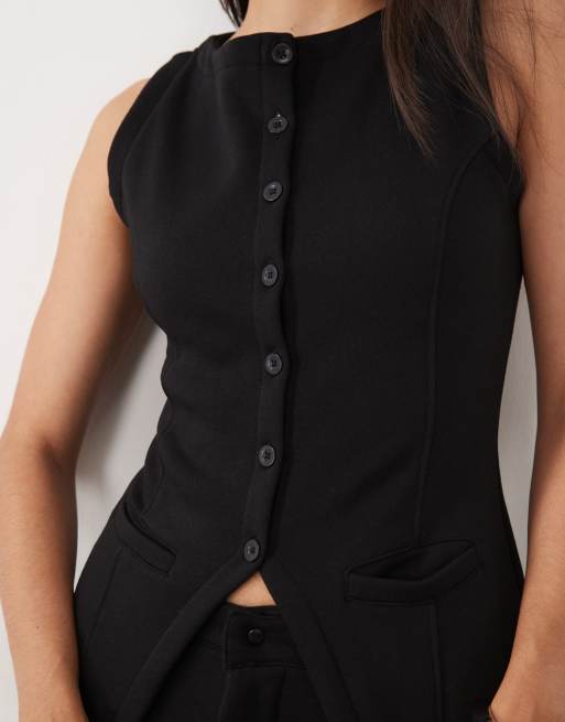 Kaiia cotton rich sleeveless button front split front sweat waistcoat top co-ord in black, 4 of 4
