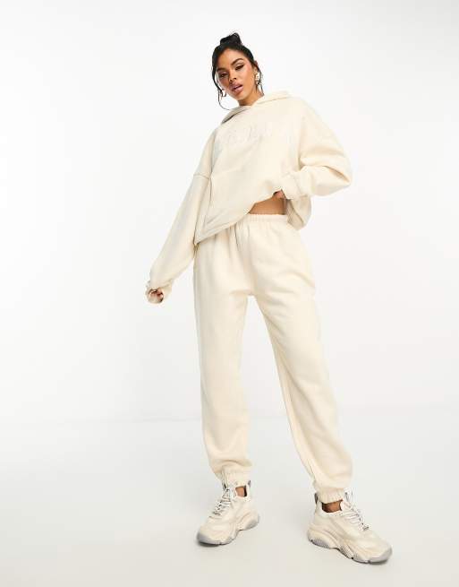 Kaiia oversized logo hoodie and cuffed sweatpants set in cream