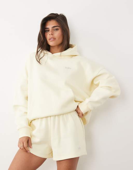 Kaiia – Cytrynowy zestaw z mieszanki bawełny ze srebrnym metalowym logo: bluza oversize z kapturem i szorty, 2 z 3
