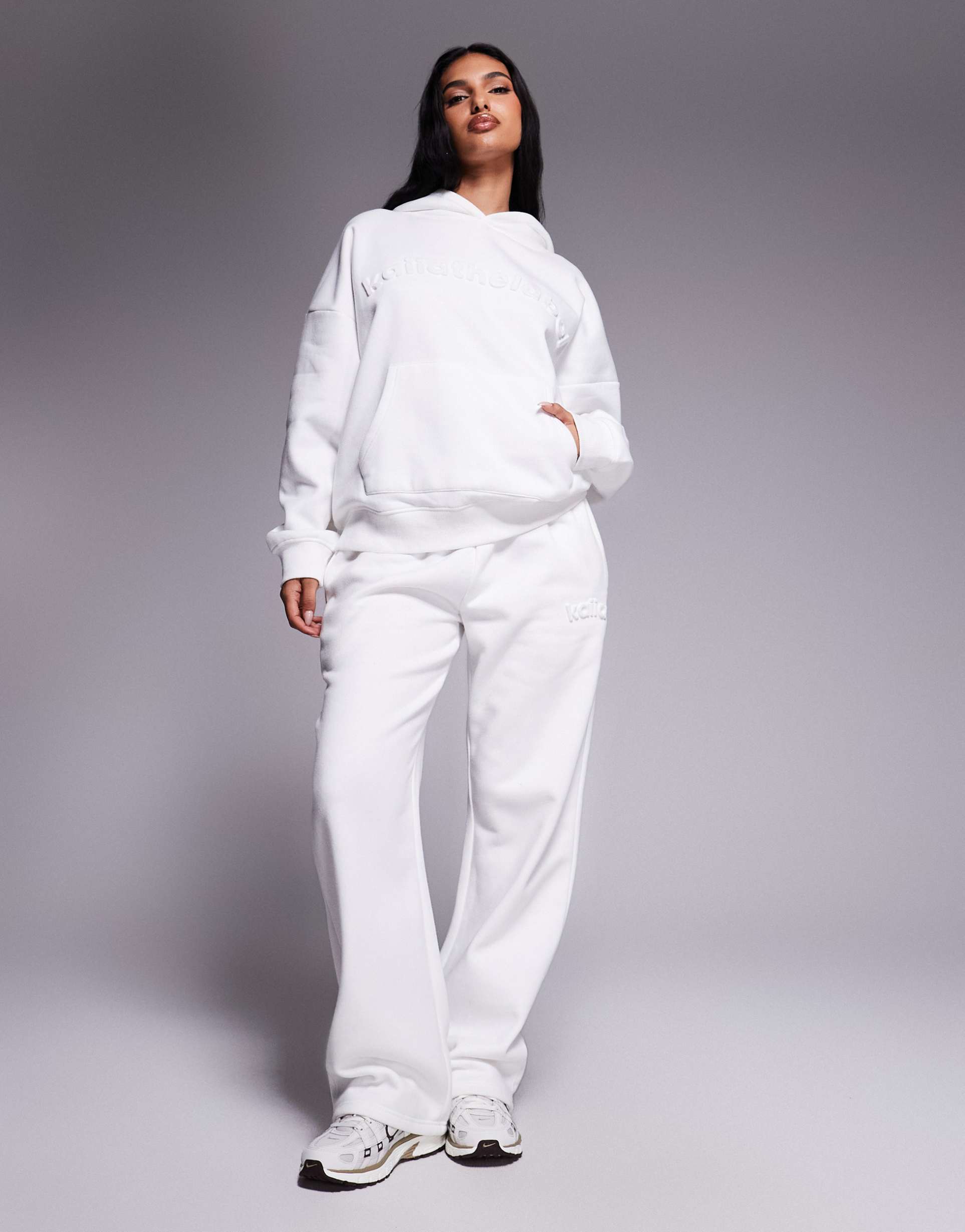 kaiia embossed logo wide leg sweatpants in white - part of a set