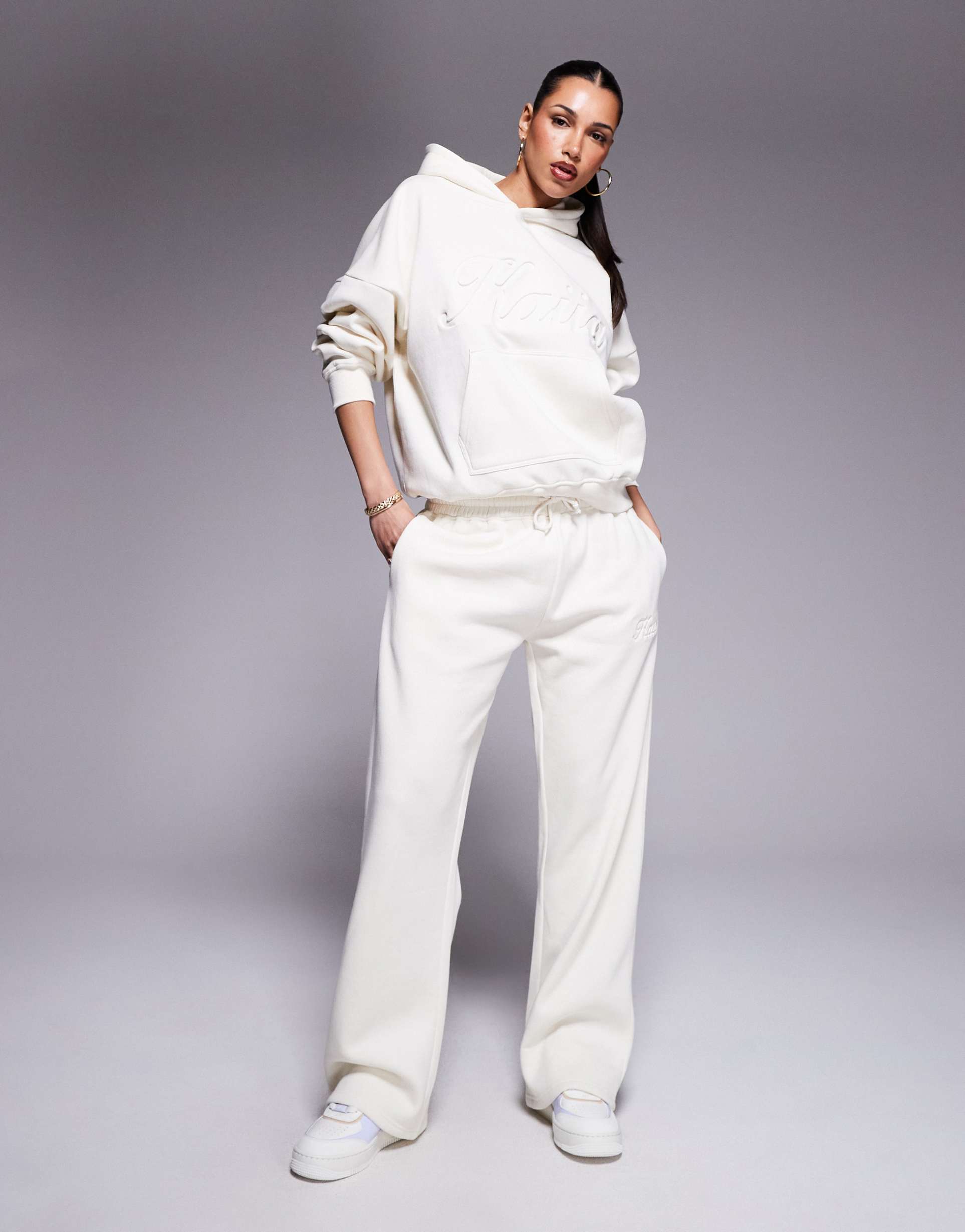 kaiia embossed script logo sweatpants in buttercream - part of a set