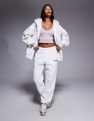 Kaiia Embroidered Logo Cuffed Sweatpants In White