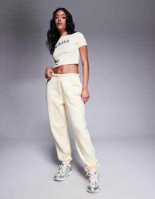 Kaiia Embroidered Logo Cuffed Sweatpants In Yellow