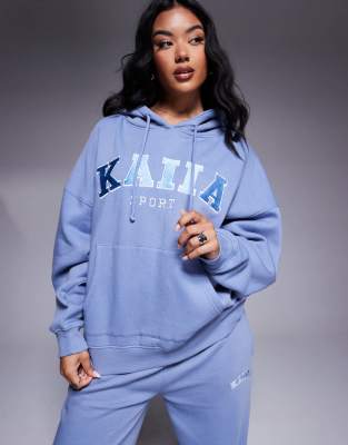 embroidered logo sport hoodie in light blue - part of a set