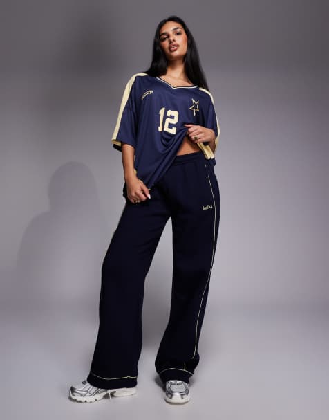 Kaiia embroidered logo wide leg sweatpants in navy and yellow - part of a set - view 1