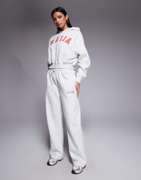 Kaiia - Ensemble en coton majoritaire avec pantalon de jogging ample et sweat à capuche oversize zippé à broderie logo - Gris chiné et corail - view 1