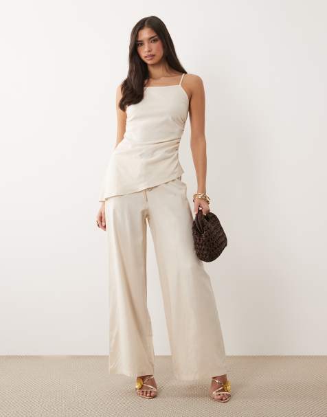 Kaiia Exclusive - Conjunto color crema de pantalones de pernera ancha y top largo asimétrico con detalle fruncido y cuello cuadrado de lino - view 1