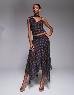 Kaiia - Exclusive - Doppellagiger, anschmiegsamer Maxirock aus Netzstoff in Braun mit Zipfelsaum und Polka Dots in Blau,...