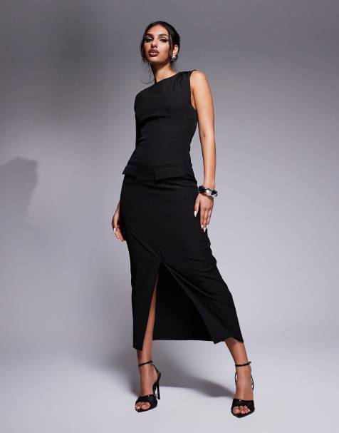 Kaiia - Exclusive - Elegante mouwloze hoogsluitende maxi jurk met zakdetail en split aan de voorkant in zwart - view 1