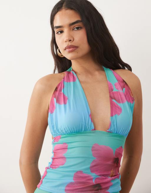 Kaiia – Exclusive – Set mit figurbetontem Neckholder-Oberteil mit Hängemattenmotiv und tiefem Ausschnitt und mit Minirock mit Blumenmuster in Aqua und Rosa, 2 von 3