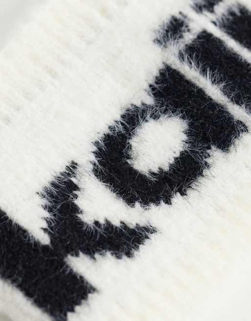 Kaiia exclusive logo gebreide haarband in zwart en wit, 2 van 3