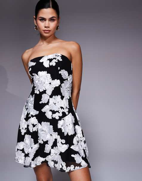 Kaiia – Exclusive – Strukturiertes Bandeau-Minikleid in Schwarz mit Blumenmuster in Weiß - view 1