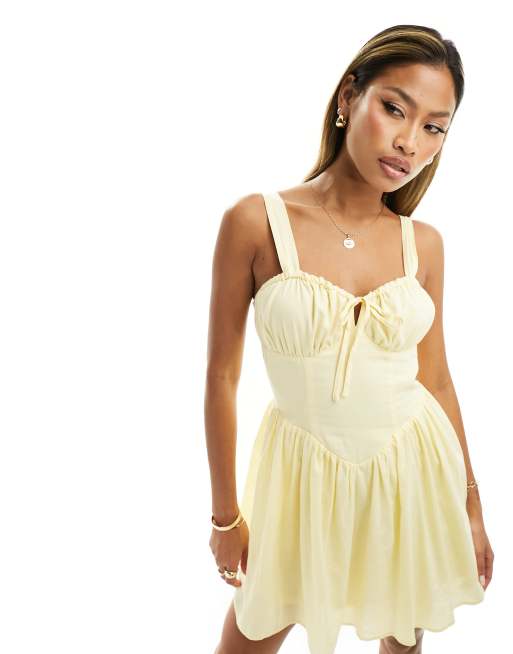 Kaiia Exclusive – Żółta sukienka mini w stylu milkmaid z wiązaniem z przodu 