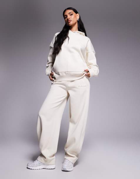 Kaiia - Exclusives - Joggingbroek met hoog katoenpercentage, wijde ronde pijpen en bol logo in reliëf in lichtbeige, deel van co-ord set - view 1