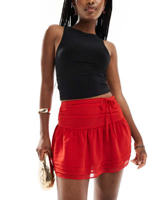 Kaiia - Exclusives - Mini rok met ruches aan de zoom en strikdetail in rood  